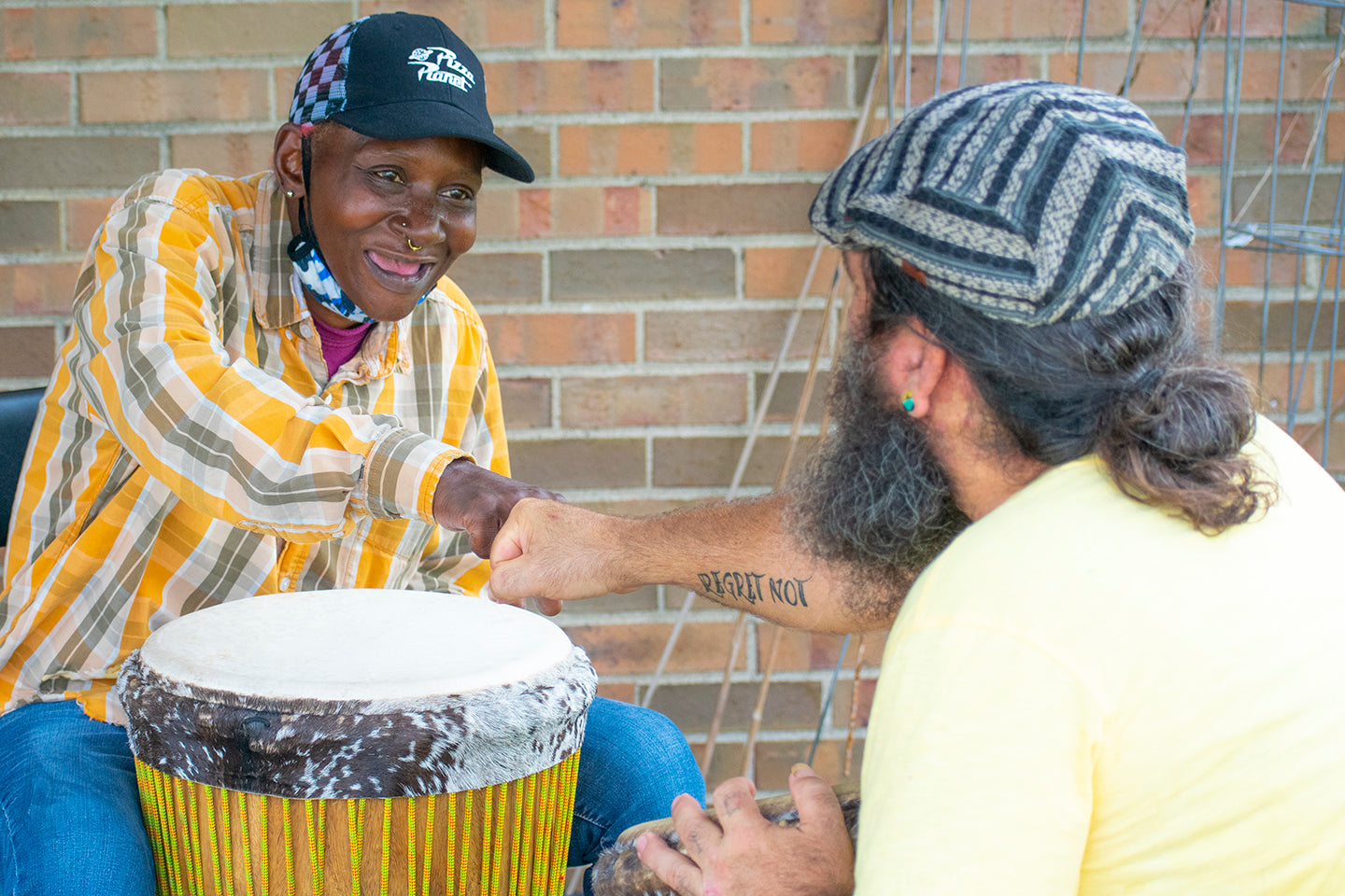 
          
            Salome and Sundance during a 1-on-1 drumming mentorship
          
        